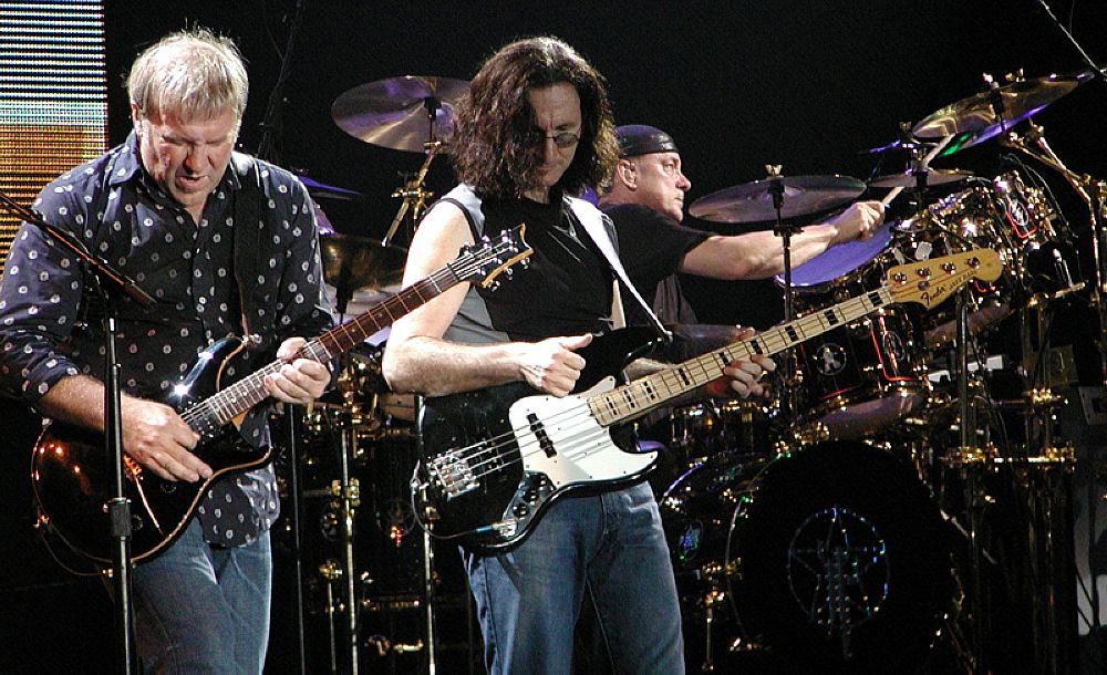 Featured image for “Rush, KISS, Joy Division, Buzzcocks – zajedno na turneji = rat na pozornici”